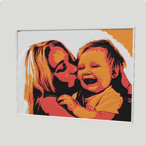 A sculpted relief of a mum kissing her baby, in the Ember palette